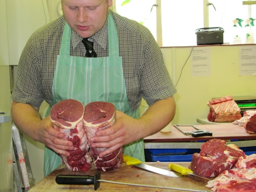 Boned and rolled brisket of Longhorn beef ready for display in the shop counter.
